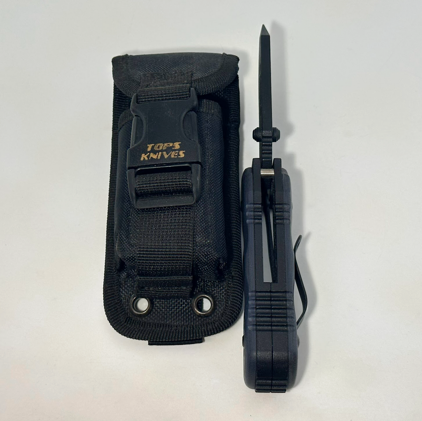 TOPS Knives XcEST Delta PRE-OWNED LIKE-NEW - Black Coated Bohler N690 Blade & Black/Blue Layered G-10 Scales over Aluminum Frame - Liner Lock w/ 3.4" Blade - Black Nylon MOLLE Sheath