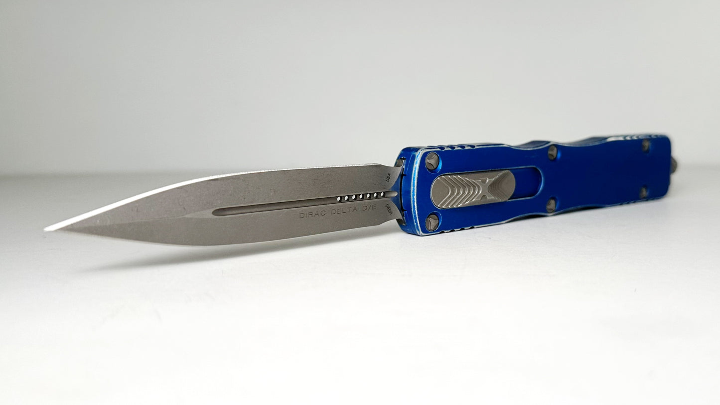 Microtech Dirac Delta 227-10DBL Pre-Owned - Apocalyptic Bohler M390 Double Edge Dagger Blade & Distressed Blue 6061-T6 Aluminum Handle - Out the Front Automatic | Made in USA
