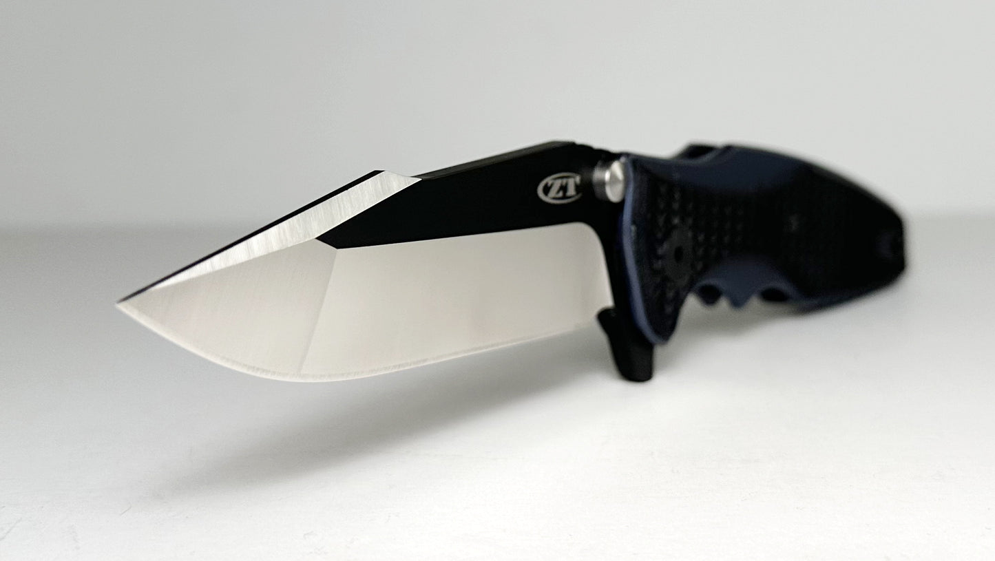 Zero Tolerance | Rick Hinderer 0393 Pre-Owned - Two-Toned 3.5" CPM-20CV Harpoon Point Blade - Blue Ano Titanium Handle w/ Machined Black G-10 Overlays - KVT Frame Lock Folder w/ Dual Studs & Flipper Tab | Made in USA