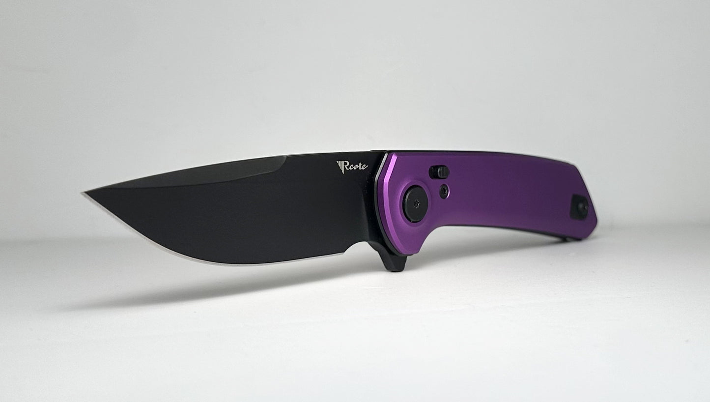 Reate PL-XF Pre-Owned - Black PVD 3.4" Nitro-V Drop Point Blade & Purple Anodized Aluminum Handle - Button Lock Flipper Knife w/ Plunge Lock | Made in China