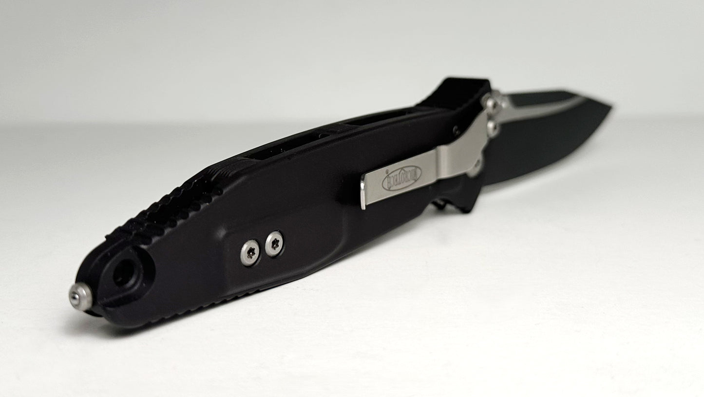 Microtech SOCOM Elite Manual 160-1 Pre-Owned - Black Coated 4.05" Bohler M390 Clip Point Blade & Black Aluminum Handle w/ Grip Inserts - Liner Lock Manual w/ Dual Thumb Studs | Made in USA