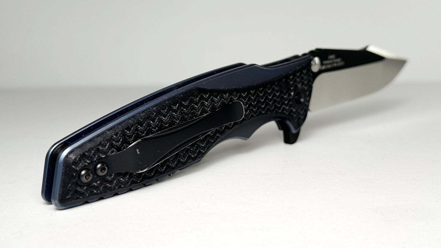 Zero Tolerance | Rick Hinderer 0393 Pre-Owned - Two-Toned 3.5" CPM-20CV Harpoon Point Blade - Blue Ano Titanium Handle w/ Machined Black G-10 Overlays - KVT Frame Lock Folder w/ Dual Studs & Flipper Tab | Made in USA