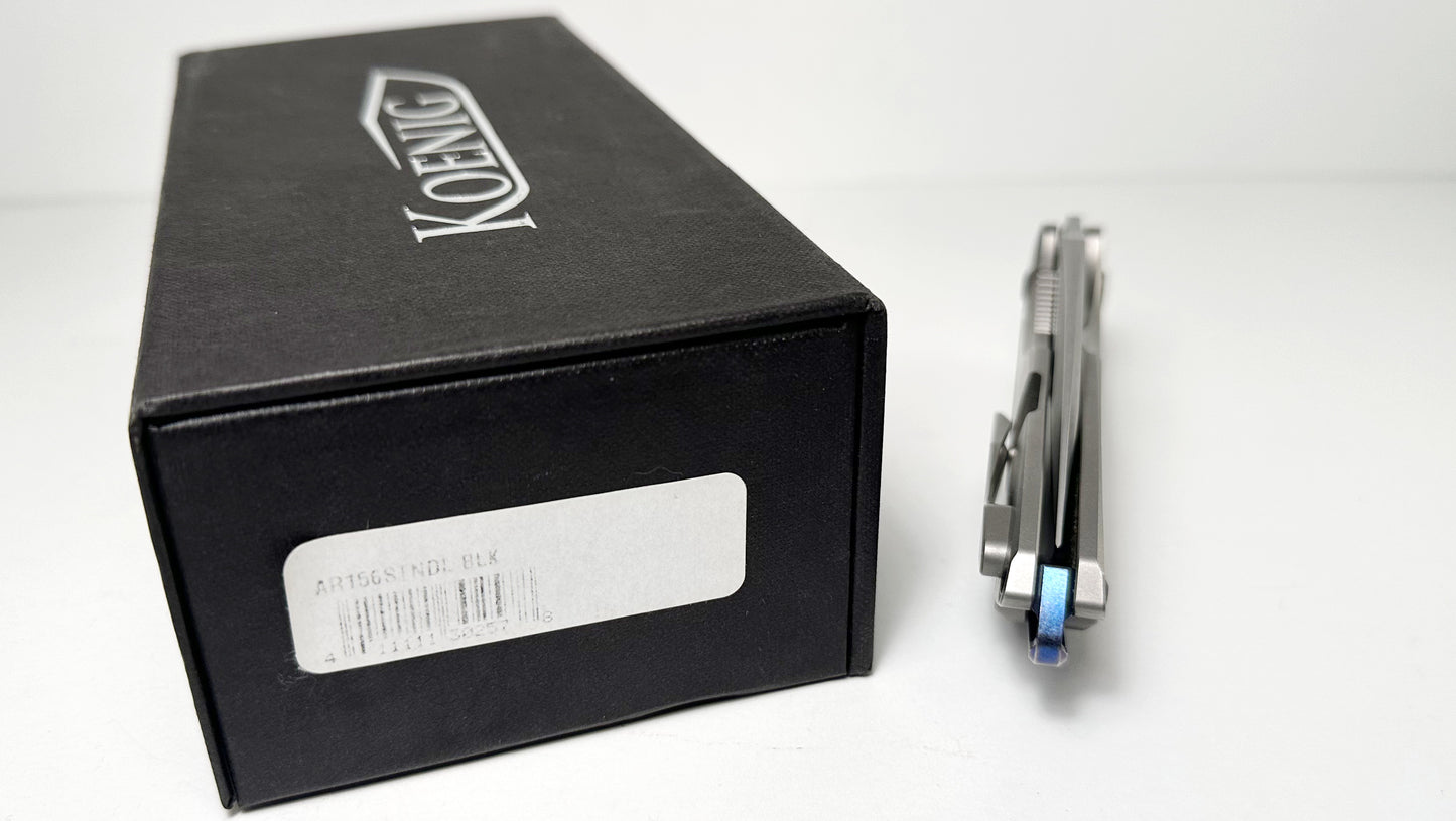 Koenig Arius Gen 2 Frame Lock Flipper Pre-Owned - Stonewash CTS-XHP Drop Point & 3D Contoured Titanium Handle - Blue Backspacer & Black Pivot | Made in USA