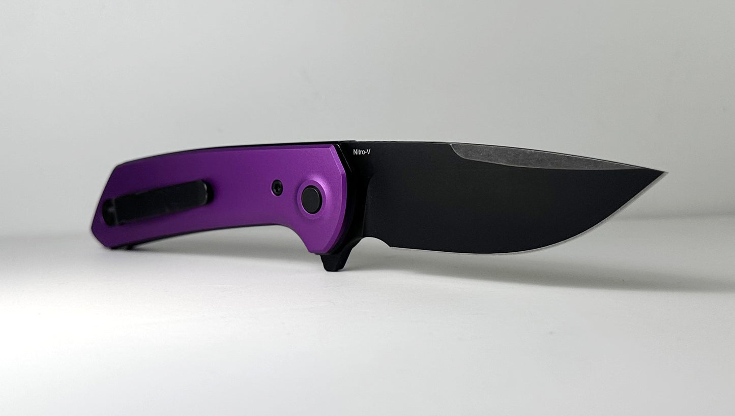 Reate PL-XF Pre-Owned - Black PVD 3.4" Nitro-V Drop Point Blade & Purple Anodized Aluminum Handle - Button Lock Flipper Knife w/ Plunge Lock | Made in China