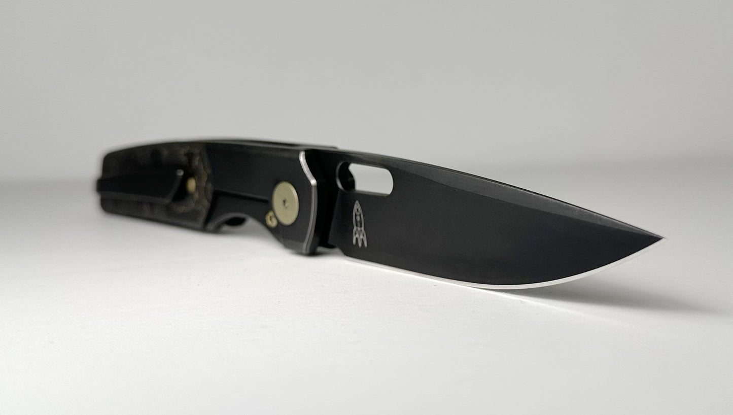 Berg Blades | NRD Sweeney Pre-Owned SN #21/60 - Black PVD CPM-20CV Drop Point Blade - Black 6AL-4V Titanium Handle w/ Gold Camo Fat Carbon Fiber Inlays & Gold Anodized Hardware - Ti Frame Lock w/ Flipper Tab | Made in China by Reate