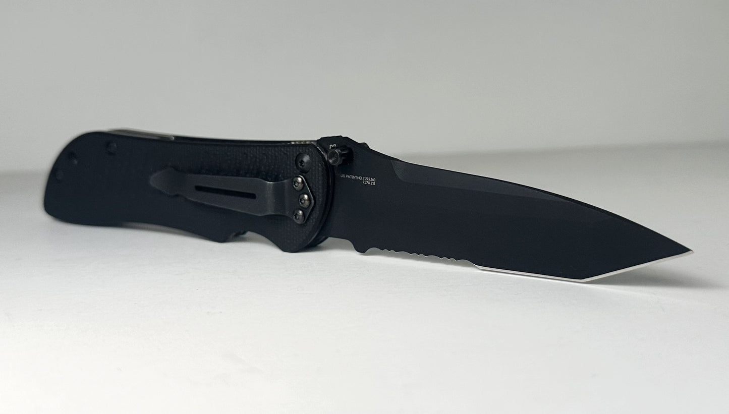 Benchmade Nitrous Stryker 912SBKD2 Pre-Owned Spring Assisted - Black Coated 3.7" CPM-D2 Partially Serrated Tanto Blade & Black G-10 Scales - Dual Thumbstud Spring Action Liner Lock | Made in USA