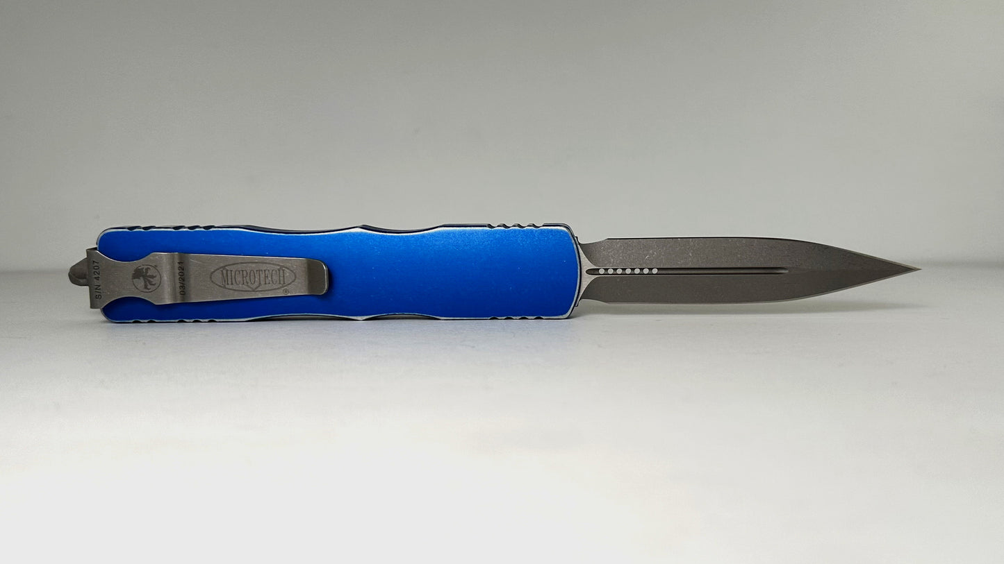 Microtech Dirac Delta 227-10DBL Pre-Owned - Apocalyptic Bohler M390 Double Edge Dagger Blade & Distressed Blue 6061-T6 Aluminum Handle - Out the Front Automatic | Made in USA