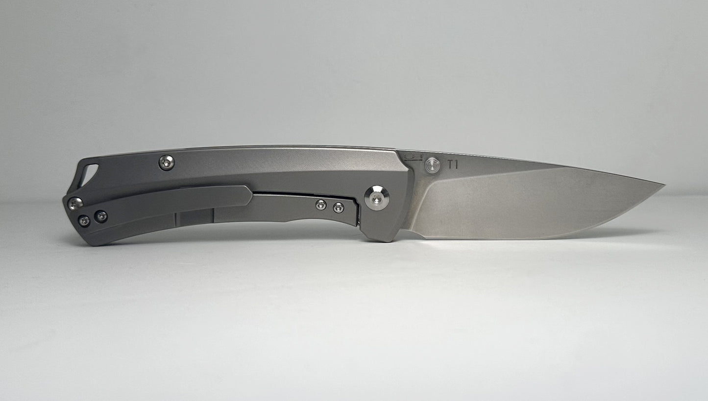 Kizer | Uli Hennicke T1 Ki3490 Pre-Owned - Stonewash 3.25" CPM-S35VN Drop Point Blade & 6AL4V Titanium Handle - Ti Frame Lock w/ Dual Studs | Made in China