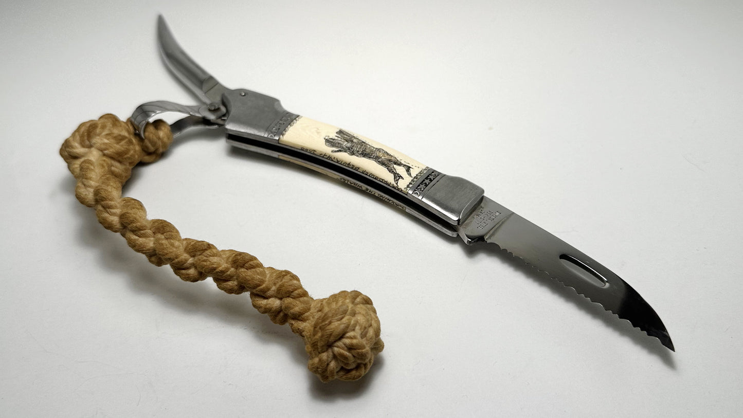 Sam McDowell Rigger Blade "Watching the Whales" Scrimshaw Pre-Owned USED - Satin Surgical Steel Serrated Saw Blade - Marlin Spike w/ Sailor-made Rope & Unoriginal Nylon Sheath | Made in Seki-City, Japan