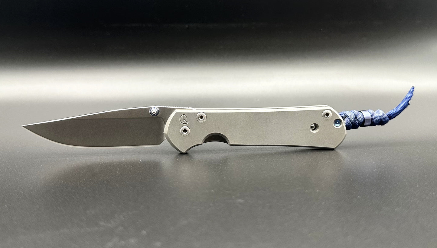 Chris Reeve Knives Small Sebenza 21 Plain Pre-Owned S21-1000 - Stonewash CPM-S35VN Drop Point Blade & 6Al4V Titanium Frame Lock Handle w/ Thumbstud & Midnight Blue Lanyard & Bead | Made in USA