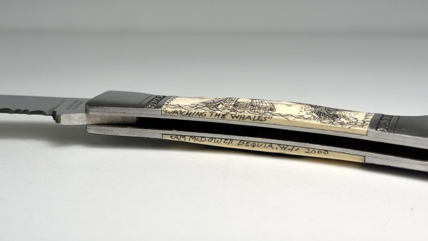 Sam McDowell Rigger Blade "Watching the Whales" Scrimshaw Pre-Owned USED - Satin Surgical Steel Serrated Saw Blade - Marlin Spike w/ Sailor-made Rope & Unoriginal Nylon Sheath | Made in Seki-City, Japan