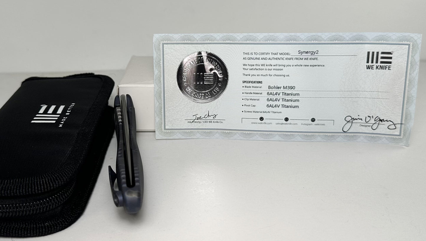 WE Knife Synergy2 Pre-Owned 912B - Stonewash 3.5" Bohler M390 Trailing Point Blade & Blue 6AL4V Titanium Handle - Integral Frame Lock w/ Flipper Tab | Made in China