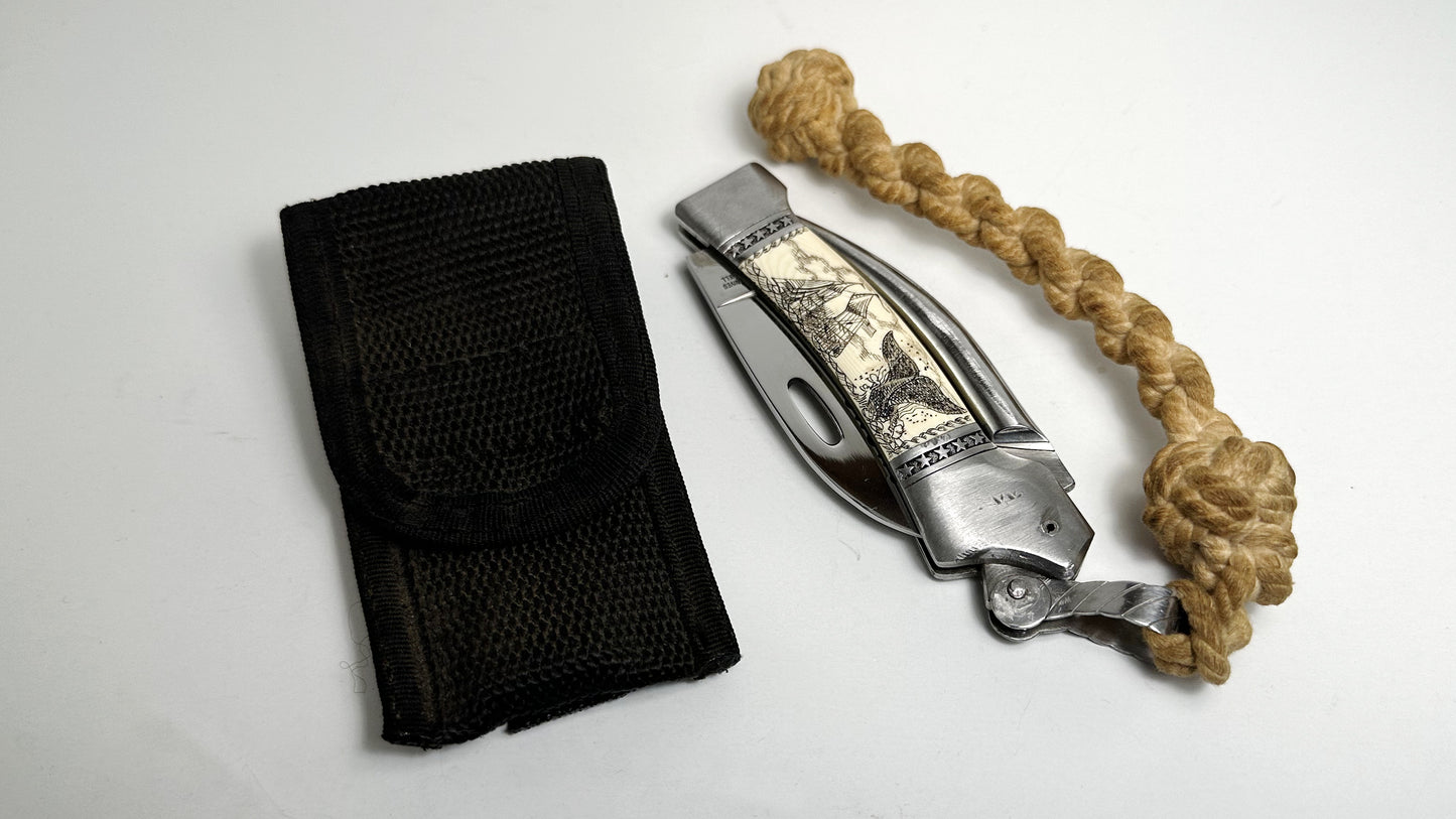 Sam McDowell Rigger Blade "Watching the Whales" Scrimshaw Pre-Owned USED - Satin Surgical Steel Serrated Saw Blade - Marlin Spike w/ Sailor-made Rope & Unoriginal Nylon Sheath | Made in Seki-City, Japan