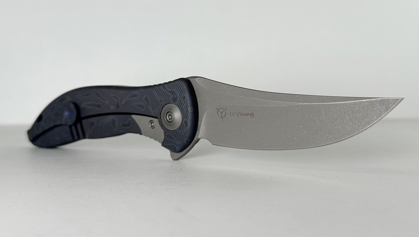 WE Knife Synergy2 Pre-Owned 912B - Stonewash 3.5" Bohler M390 Trailing Point Blade & Blue 6AL4V Titanium Handle - Integral Frame Lock w/ Flipper Tab | Made in China