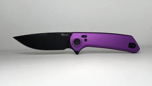 Reate PL-XF Pre-Owned - Black PVD 3.4" Nitro-V Drop Point Blade & Purple Anodized Aluminum Handle - Button Lock Flipper Knife w/ Plunge Lock | Made in China